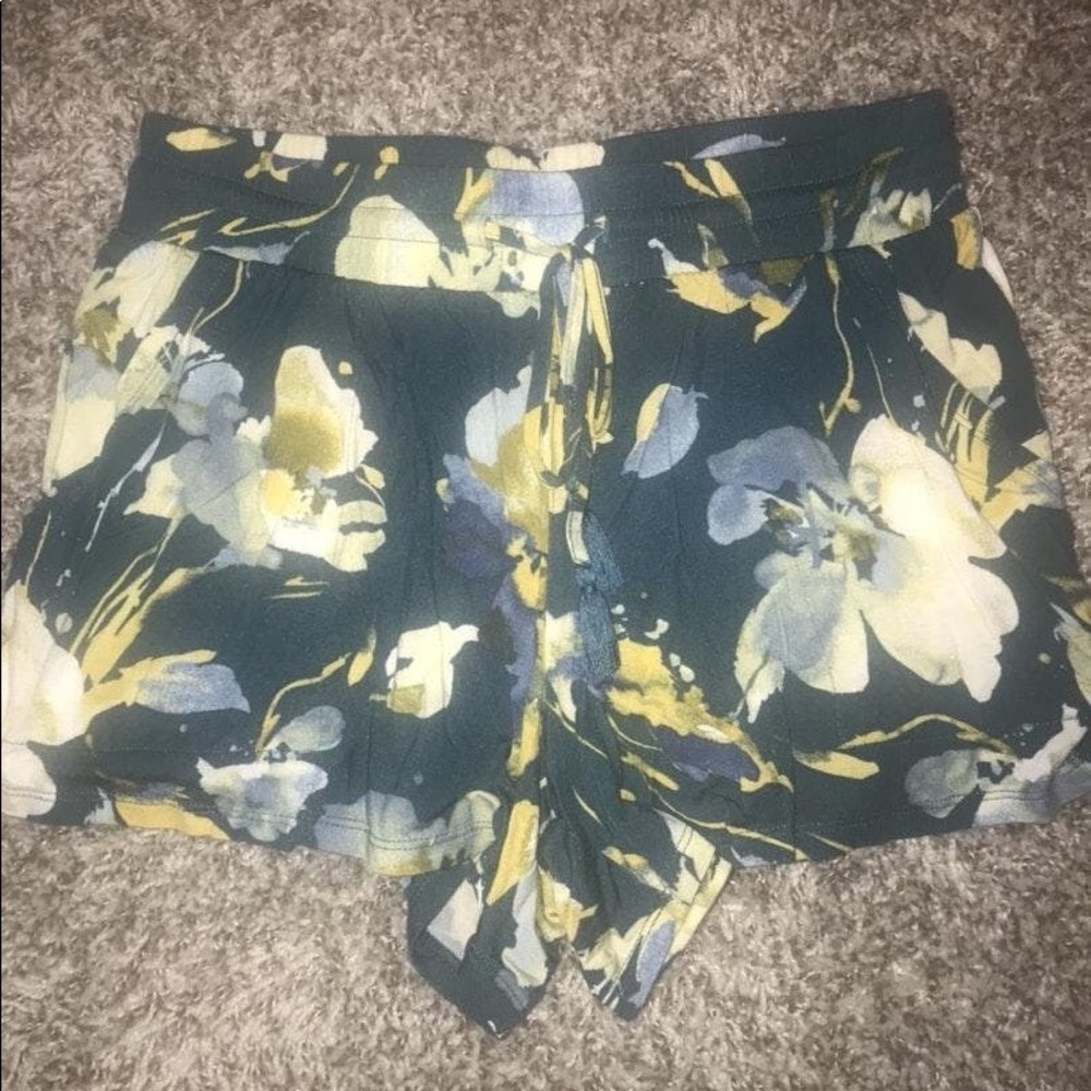 Star above floral shorts